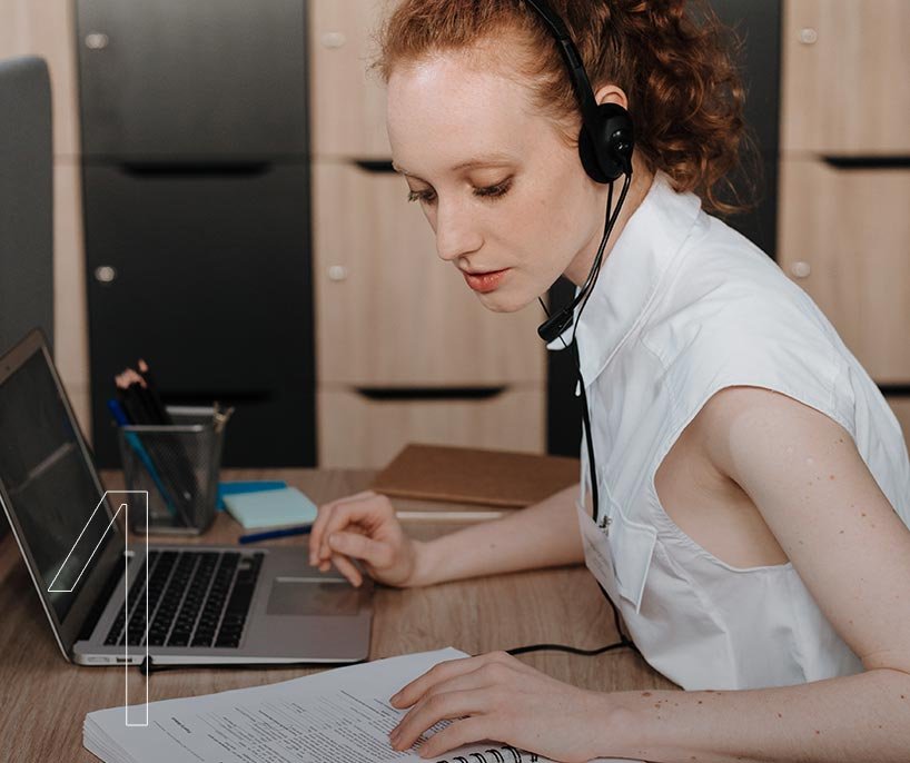 Real estate investment advisor conducting research and client consultation.